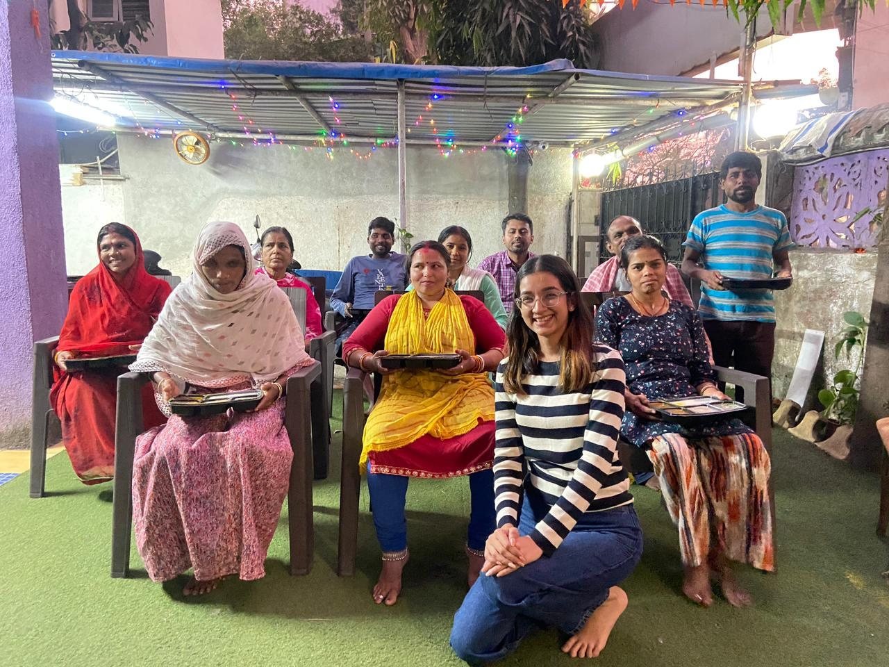 Community members with The Social Architects Foundation team
